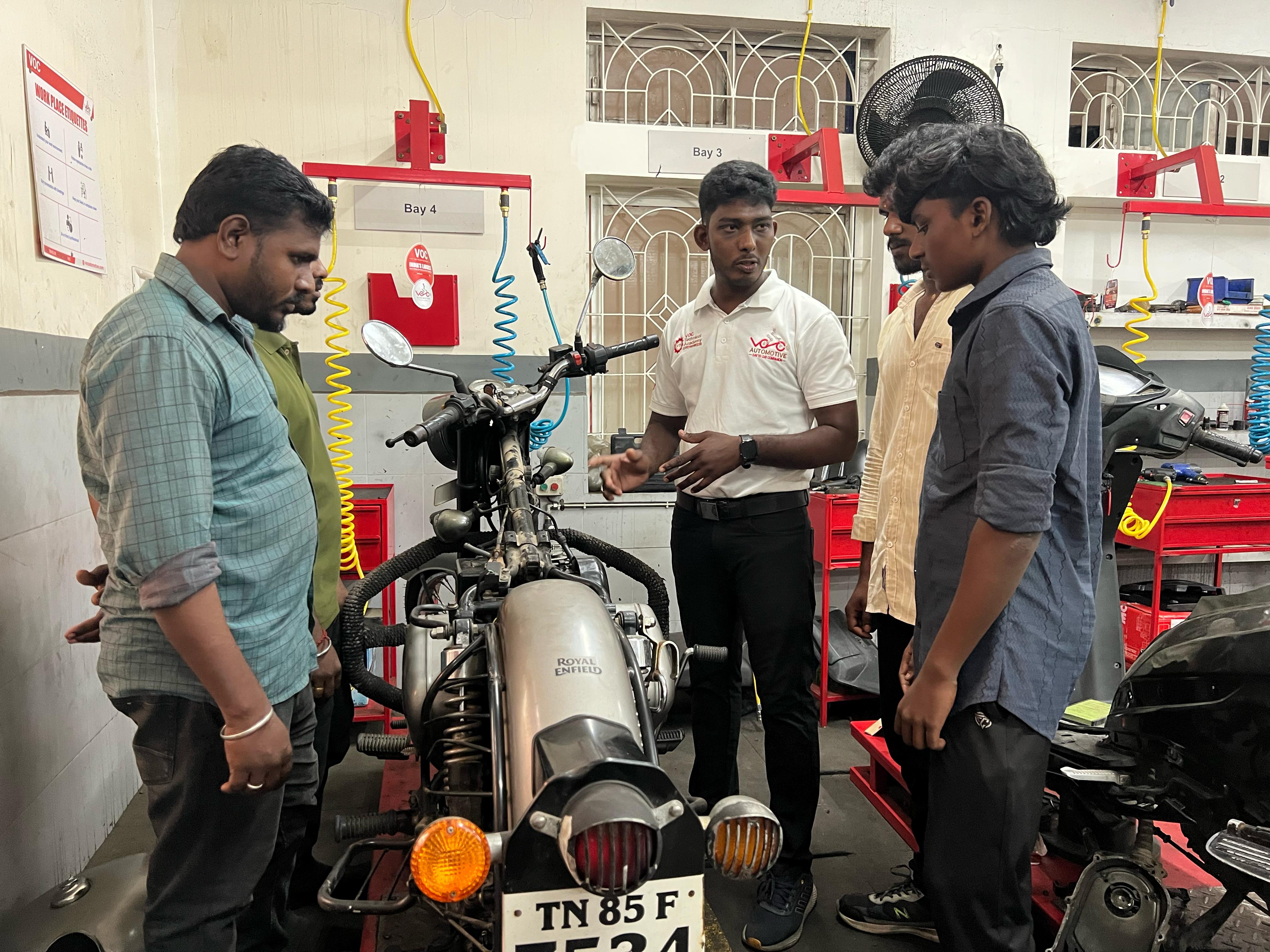 An instructor provides a hands-on technical training session, facilitated by JBSI, VOC, and ARPNA